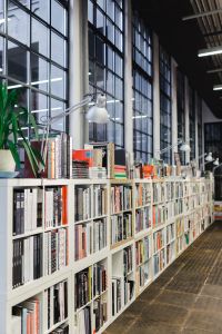 Kaboompics - Rows of different colorful books lying on the shelves in the modern urban bookshop