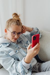Kaboompics - Close Up of Teenager Using Smartphone