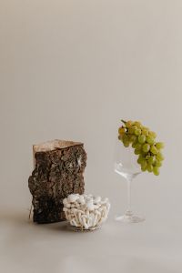 Kaboompics - Mushroom Still Life with Bark and Green Grapes