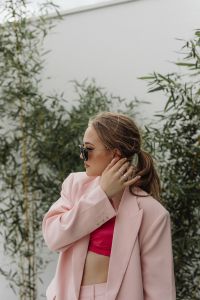 Kaboompics - Woman in a Pale Pink Blazer Outdoors with Sunglasses