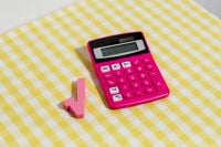 Kaboompics - Close-Up of a Pink Calculator With a Square Root Symbol