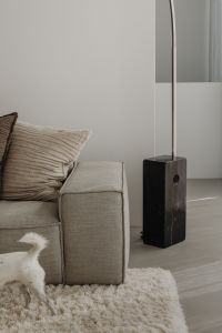 Kaboompics - Neutral Sofa with Black Marble Lamp Base in a Bright Living Room