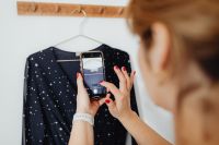 Kaboompics - Capturing a Navy Polka Dot Dress with a Phone for an Online Store