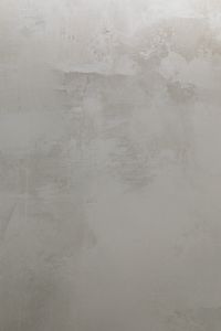 Kaboompics - Light Gray Plaster Wall with Broad Patches
