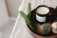 Kaboompics - Close Up of Green Christmas Candle and Paper Ornament