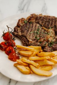 Kaboompics - Steak with Fries and Roasted Tomatoes