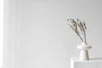 Kaboompics - Small White Vase of Dried Lavender on a Plinth