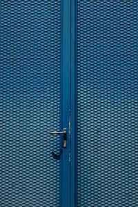 Kaboompics - Blue Metal Door with Diamond Pattern Texture and Handle, Italy