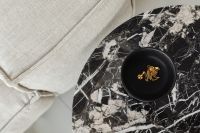 Kaboompics - Round Marble Side Table With Jewelry And Gold Chain