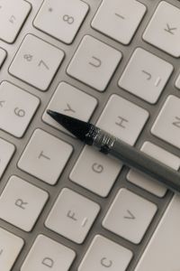 Kaboompics - Pencil on White Computer Keyboard