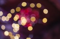 Kaboompics - Blurred Burgundy Christmas Ornaments with Warm Golden Lights
