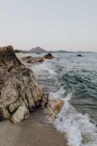 Kaboompics - Close Rocky Coastline with Moving Water, Textured Coastal Nature Background for Design