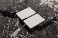 Kaboompics - Two Blank White Business Cards on Black Marble, Diagonal Horizontal Mockup