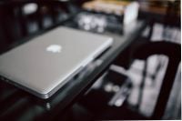 Kaboompics - Organized desk with laptop and journals