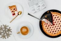 Kaboompics - Overhead Blueberry Pie with Cappuccino, Pie Slice and Christmas Wrapping