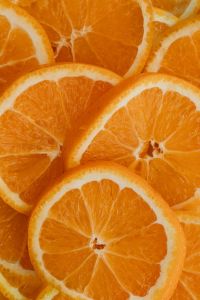 Kaboompics - Juicy Orange Slices in Extreme Close-Up, Bright Citrus Texture for Summer Backgrounds