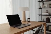Kaboompics - Neutral Home Office with Wooden Desk, Laptop and Travertine Lamp