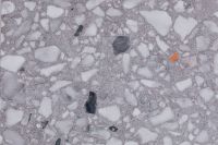 Kaboompics - Speckled Gray Terrazzo with White, Charcoal and Single Rust-Orange Stone Chip