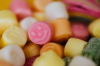 Kaboompics - Pink Smiley Face Gummy Candy in a Soft-Focus Pastel Macro