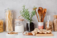 Kaboompics - Zero-Waste Pantry Storage with Glass Jars, Fresh Rosemary, Ginger and Wooden Utensils