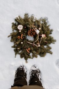 Kaboompics - Winter Wreath on Snow With Snowy Boots in Frame