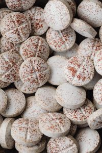 Kaboompics - Close-Up of Speckled Scored Tablets on Marble