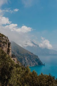 Kaboompics - Blue Sky and Clouds over an Amalfi Coast Cliff with Copy Space