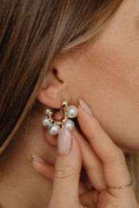 Kaboompics - Close-Up of Pearl Earring and Gold Ring