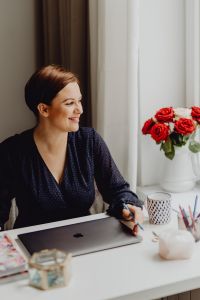 Kaboompics - Happy casual beautiful woman working on a laptop