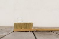 Kaboompics - Single Soap Bubble Resting on a Wooden Bristle Brush