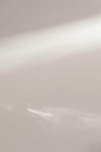 Kaboompics - Light Gray Textured Wall with Diagonal Light Stripe