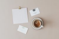 Kaboompics - Blank Cards and Business Stationery with Cappuccino on Warm Beige Desk