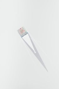 Kaboompics - Small Iridescent Prism and Elongated Shadow for Minimal Abstract Wallpaper