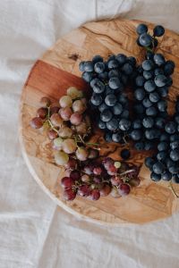 Kaboompics - Overhead Grape Medley on a Carved Wooden Board
