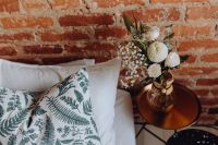 Kaboompics - White Rose and Pompom Flower Bouquet on a Brass Bedside Table, Brick Wall Bedroom Decor