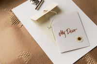 Kaboompics - My Dear Greeting Card with String Envelope and Dried Daisy