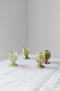 Kaboompics - Translucent Glass Vases on White Linen for Minimalist Product Styling