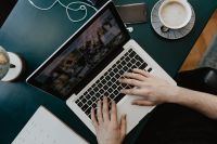 Kaboompics - Overhead Home Office with Laptop, Coffee Cup, Smartphone and Open Planner