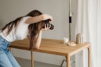 Kaboompics - DSLR Camera Photographing Candle and Styled Tabletop