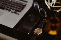 Kaboompics - Soft Focus Laptop Workspace with Smartphone and Gold Wristwatch