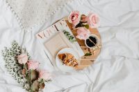 Kaboompics - Croissant and Coffee on a Wooden Tray with Pink Roses