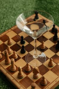 Kaboompics - Chessboard and Martini Glass Top View