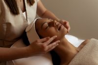 Kaboompics - Skincare Practitioner Massaging Woman's Face