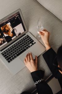 Kaboompics - Top View of Laptop and Wine Glass on a Sofa
