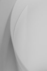 Kaboompics - White Paper Fold With Rounded Minimal Shapes
