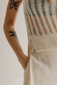 Kaboompics - Woman in a Textured Knit Top and White Pants