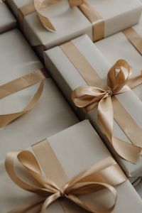 Kaboompics - Minimal White Gift Wrapping with Satin Ribbon