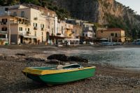 Kaboompics - Close-Up of a Yellow-Green Fishing Boat Bow Below the Marina di Puolo Waterfront