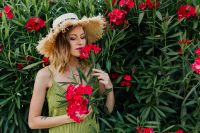 Kaboompics - Relaxed Summer Garden Portrait of a Woman Among Pink Flowers