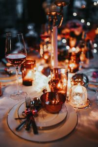 Kaboompics - Rose Wine Glass with Candlelight and Festive Bokeh